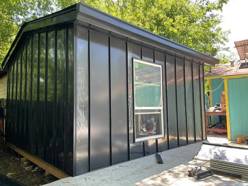 Black standing seam metal wall panels for Roof Inspection in Wall