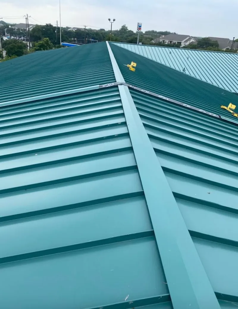 Green commercial metal roof ridge and valley for Metal Roof Repair in Wall